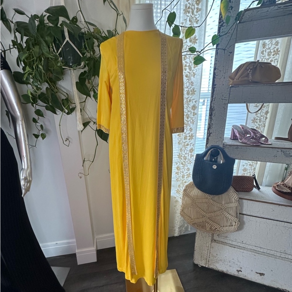 Vintage Elegant Yellow Wrap Dress with Gold Accents